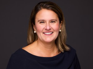 Headshot of Lisa McCracken, head of research & analytics at NIC.
