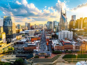 Aerial Perspective of Broadway, Downtown Nashville, Tennessee Skyline from the Cumberland River near the Stadium at Sunset
