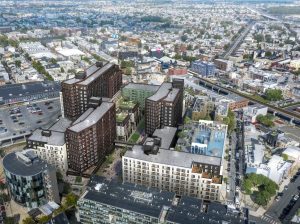 A rendering of the completed Piazza Alta project. Phase 2 will span two buildings totaling 695 units. Image courtesy of Post Brothers