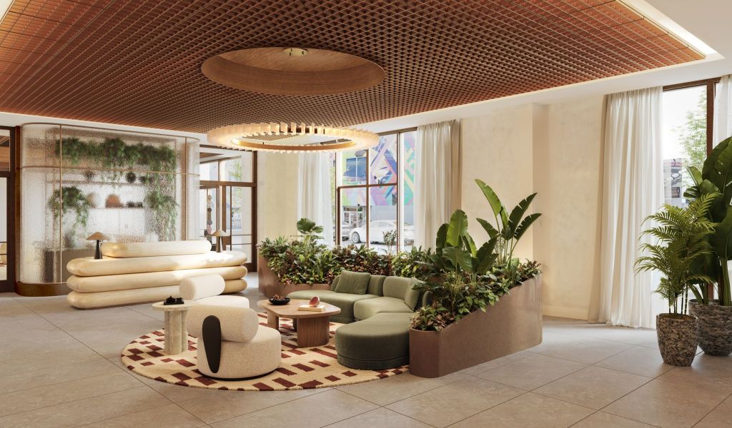 The lobby at The Could One Hotel & Residences Lobby includes co-working spaces