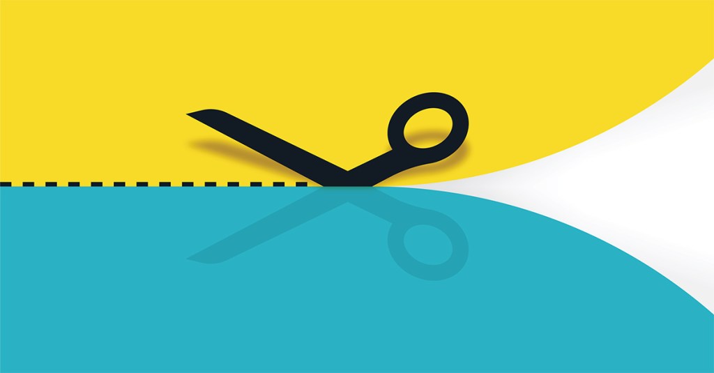 Scissors cutting paper concept.
