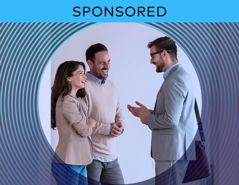 A stock image of a property manager talking with renters