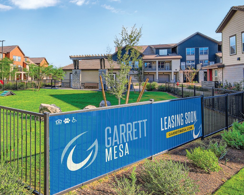 Exterior shot of Garrett Mesa, with plenty of green space and a leasing sign; image sent by Joe Gose