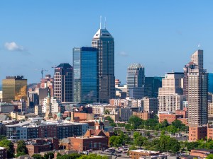 Indianapolis, United States – July 11, 2025: Tight drone shot of modern skyscrapers and high-rises in downtown Indianapolis, Indiana on a clear summer morning.