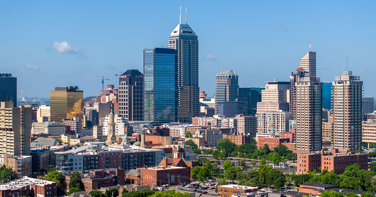 Indianapolis, United States – July 11, 2025: Tight drone shot of modern skyscrapers and high-rises in downtown Indianapolis, Indiana on a clear summer morning.