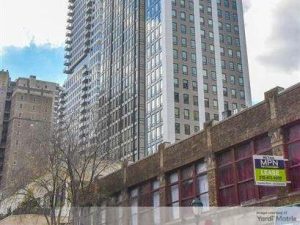 Exterior shot of The Harper, a 167-unit residential tower in Philadelphia.