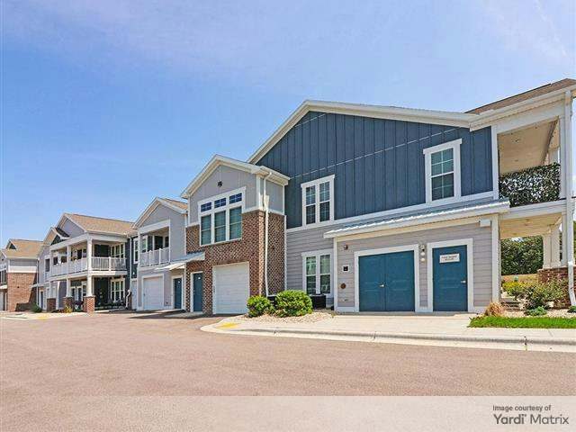 Exterior shot of one of the buildings at Wrenfield at Pleasant View, a 300-unit upscale community in Madison, Wis.