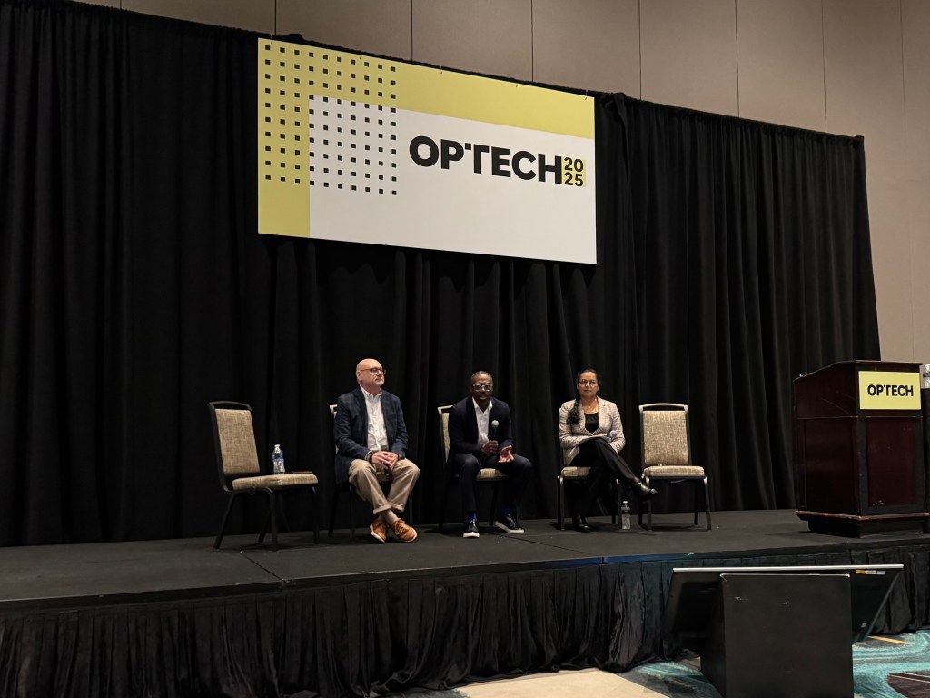 A photo of a panel on the future of data at OPTECH.