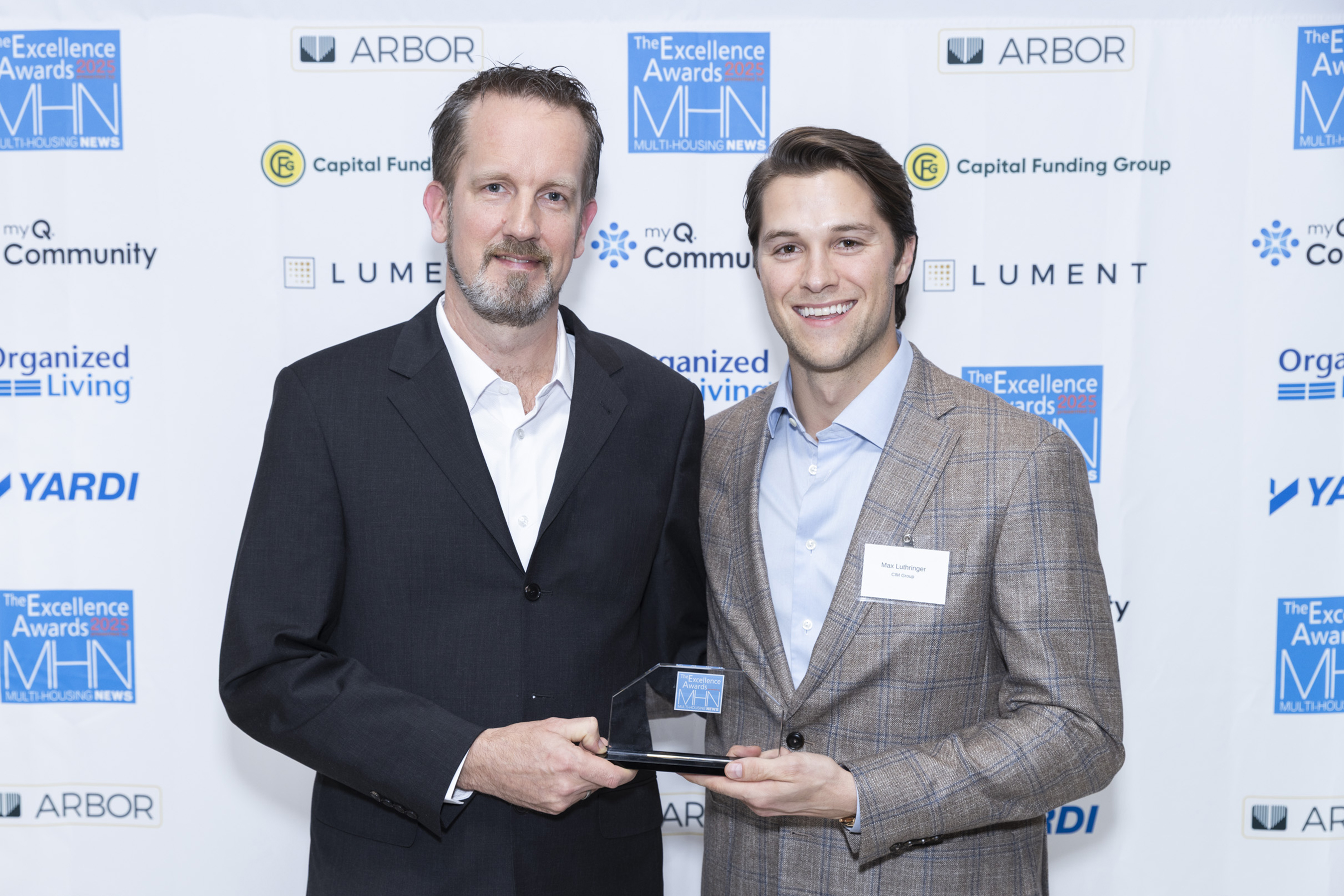 Martin Zocher, CBT Architects and Max Luthringer, CIM Group. CBT Architects won Gold, Development & Design: Mixed Use for Ldyl Fenway. Image by Gary Spector