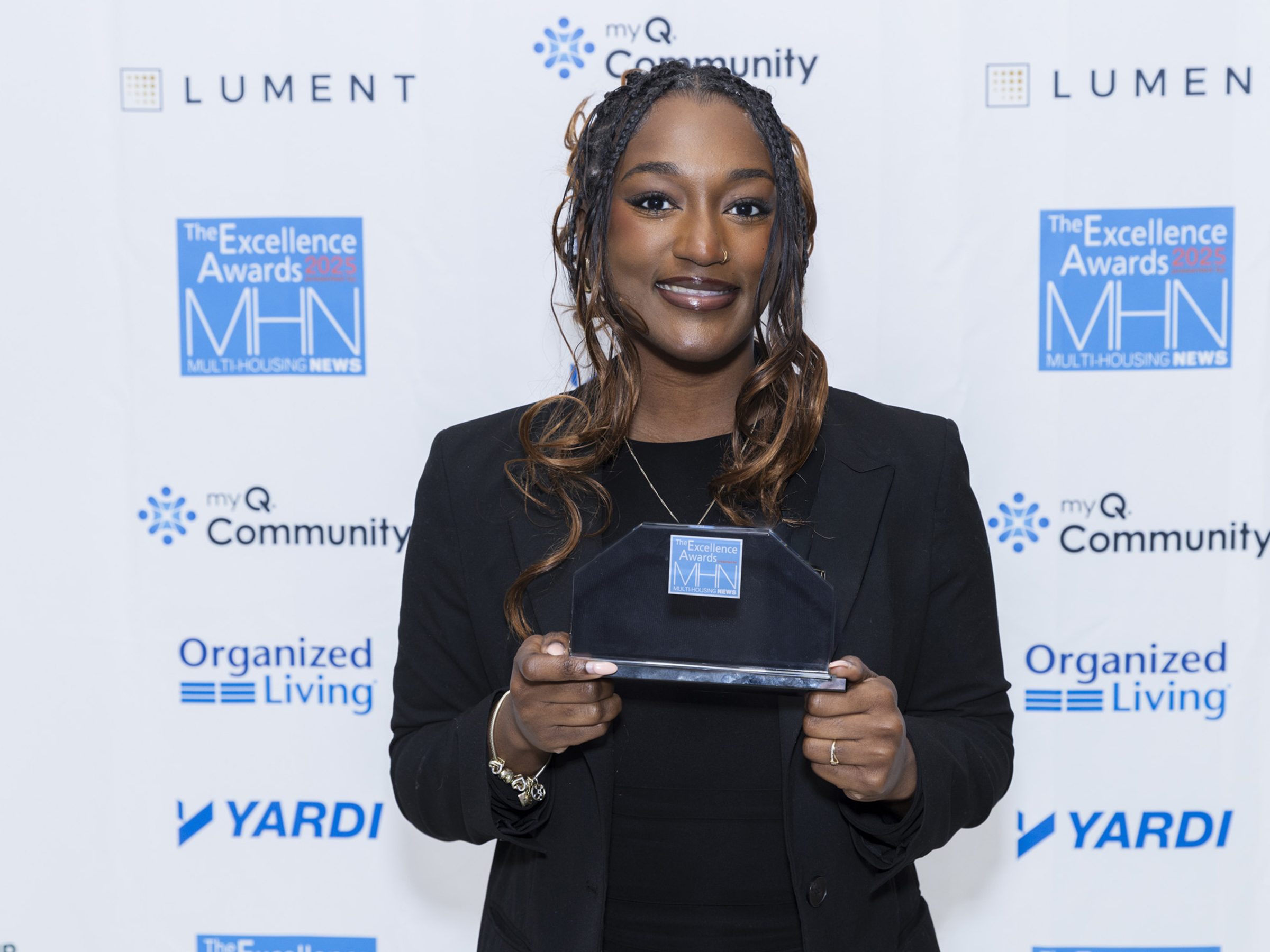 Naveah Arrington of The Breedan Company, winner of the Rising Star award, Bronze for work at Lake Taylor Pointe Apartments. Photo by Gary Spector