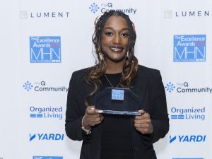 Naveah Arrington of The Breedan Company, winner of the Rising Star award, Bronze for work at Lake Taylor Pointe Apartments. Photo by Gary Spector