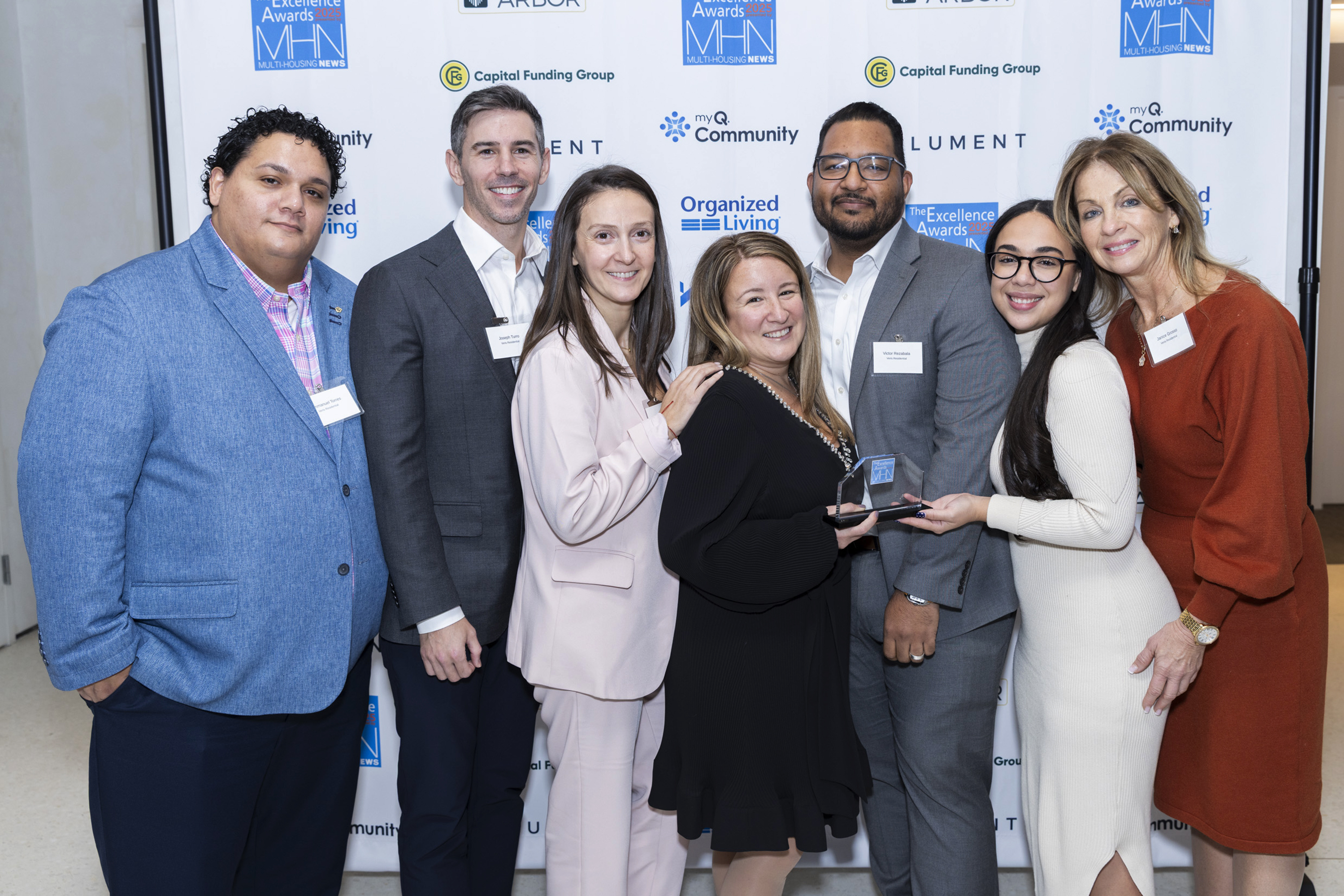 Group photo of Veris Residential team. Veris Residential won several awards: Gold, Property Manager of the Year (Erga Hoxha) and Leasing Professional of the Year (Joseph Turro); Silver, Leasing Professional of the Year (Victor Rezabala) and Best Technology; and Bronze, Facilities & Maintenance Manager of the Year (Emmanuel Torres) and Best Value-Add Renovation for Liberty Towers. Image by Gary Spector