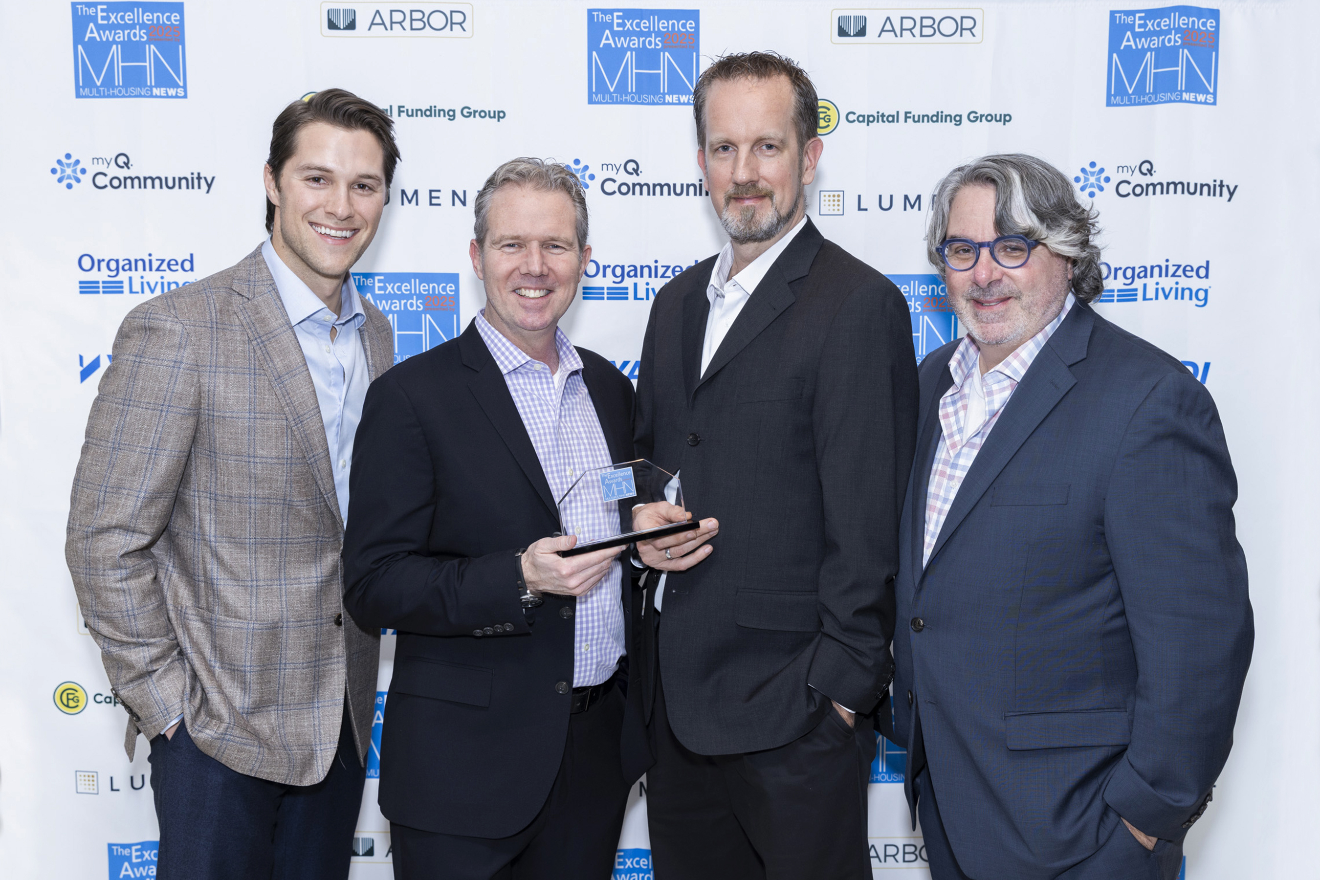 Max Luthringer, CIM Group; Phil Casey, CBT Architects; Martin Zocher and Henry Celli, CBT Architects. CBT Architects won Gold, Development & Design: Mixed Use for Ldyl Fenway. Image by Gary Spector