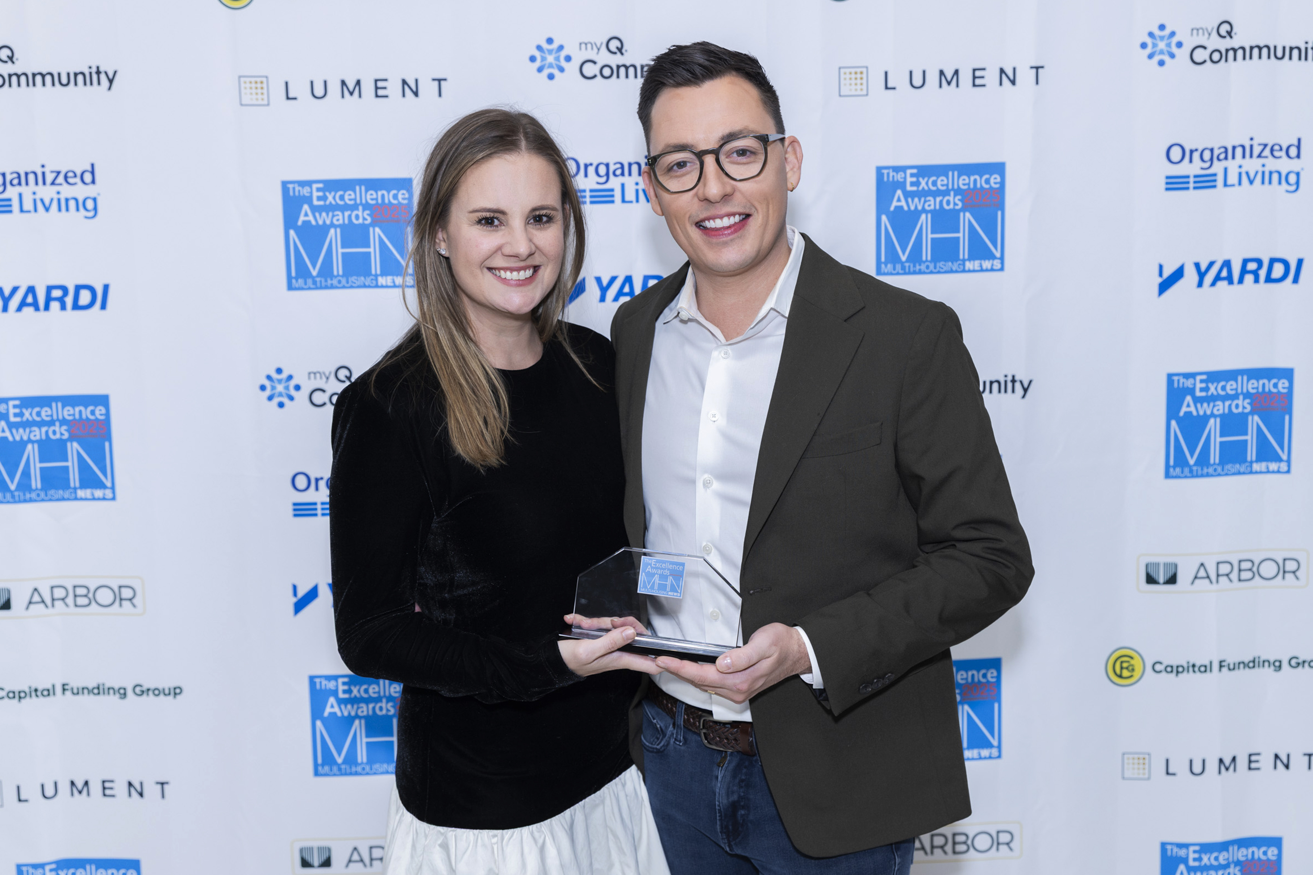 Tara Houston and Josh Kassing, Mary Cook Associates. Mary Cook Associates along with Toll Brothers Campus Living and KTGY won Silver, Development & Design Student Housing for work on The 87 at Notre Dame University. Image by Gary Spector
