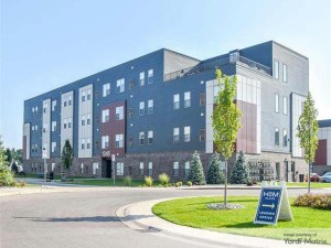 Exterior shot depicting one of the 12 buildings that make up the first two phases of HōM Flats at 28 West in Wyoming, Mich.