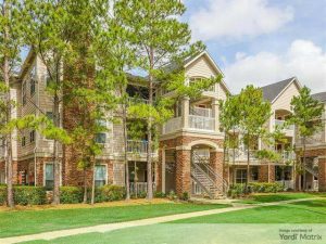 Exterior shot of The Lodge at Spring Shadows, a 432-unit multifamily community in Houston.