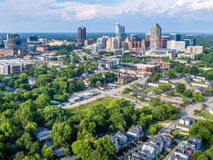 View of downtown Raleigh, North Carolina with blue sky background.