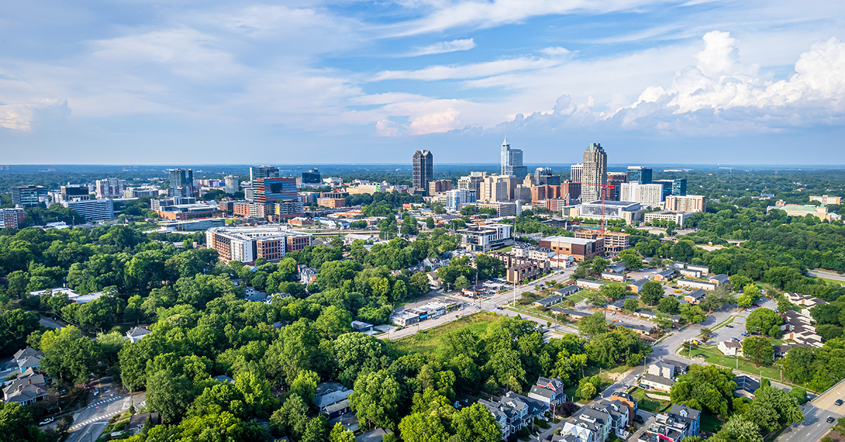 View of downtown Raleigh, North Carolina with blue sky background.