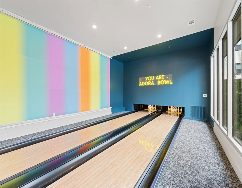 A private two lane bowling lounge at The Vic on Park Row in Houston, developed by Hunington.