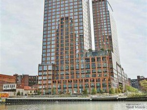 Outside shot depicting Tower 77, a multifamily property by Clipper Equities in Brooklyn.