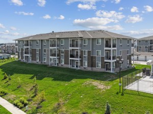 Outside shot depicting one of the four buildings that make up the multifamily community Fountain Terrace in West Des Moines, Iowa.