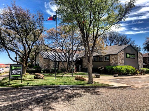 Exterior shot of one of the buildings within Bentwood Apartments, a rental community in Lubbock, Texas