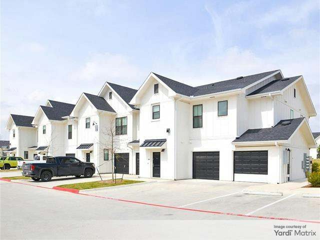 Exterior shot of Emerson at Wells Branch, a 352-unit community in metro Austin.