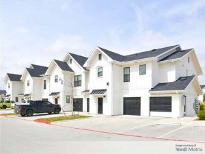 Exterior shot of Emerson at Wells Branch, a 352-unit community in metro Austin.