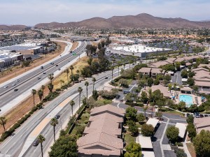 Menifee, California, USA - June 6, 2022: Afternoon light shines on a neighborhood and downtown core of Menifee.