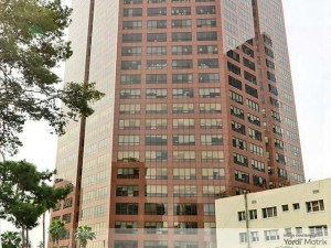 Exterior shot depicting the office tower at 1055 W. 7th St. in Los Angeles, which Jamison Services is converting to multifamily.