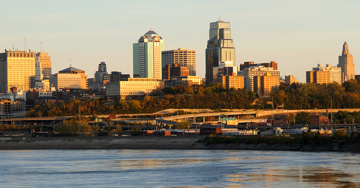 An eastward view of the Kansas City skyline in late afternoon with the Missouri River in the foreground. Kansas City, MO, USA - November 4, 2011
