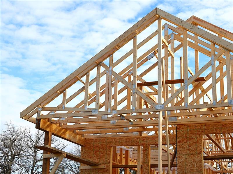 Exterior shot depicting the construction of a garden style multifamily property.