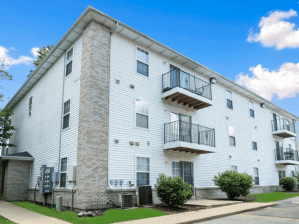 Exterior shot of Grove at Main, a 165-unit, garden-style community in Blooming, Ill.