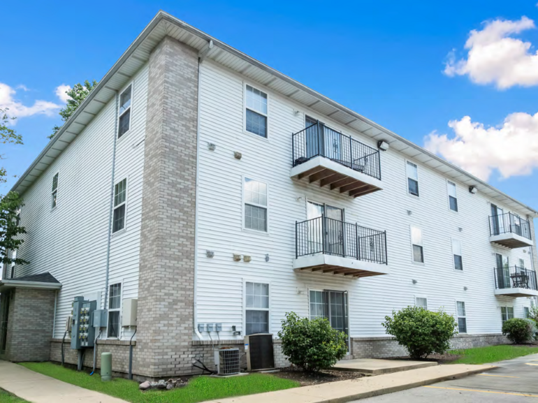 Exterior shot of Grove at Main, a 165-unit, garden-style community in Blooming, Ill.