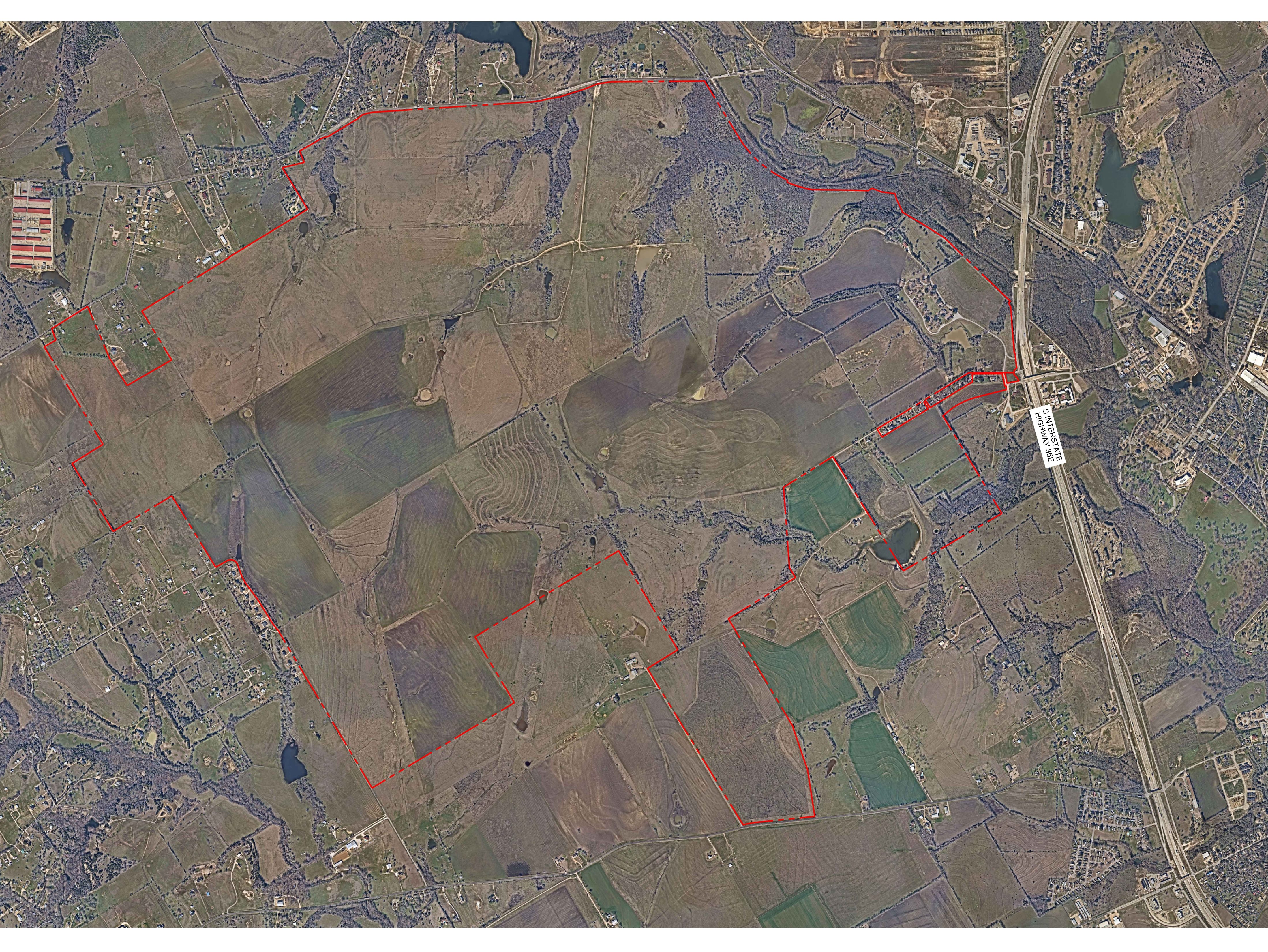 Aerial shot of the land where Minto Communities USA will develop its master-planned community.