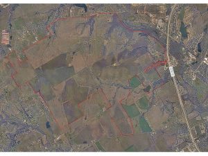 Aerial shot of the land where Minto Communities USA will develop its master-planned community.