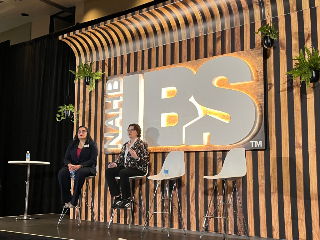 A photo of the 2026 multifamily economic forecast presented by Molly Boesel, senior principal economist, Cotality and Danushka Nanayakkara-Skillington, NAHB’s assistant vice president for forecasting and analysis.