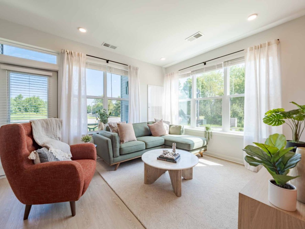 spacious and bright living room within The Crossing redevelopment in Burlington, NJ