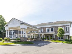 Exterior shot of The Residence at Selleck's Woods, a 102-unit senior community in Darien, Conn.
