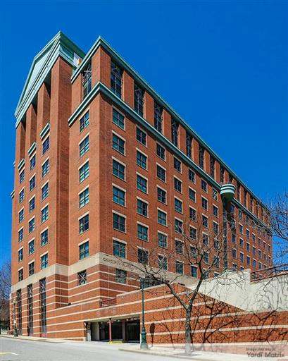 Exterior shot featuring the office building at 10 Chestnut St. in Worcester, Mass., that Synergy Investments is converting into a multifamily property.