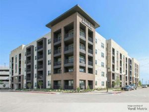 Exterior shot of Aura Avant, a 300-unit apartment community in Lewisville, texas.