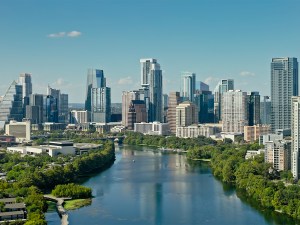 Aerial shot of Downtown Austin, Texas and Lady Bird Lake on a warm, sunny day. • Authorization was obtained from the FAA for this operation in restricted airspace.