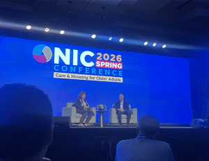 Beth Mace and Mark Zandi at NIC Spring Conference