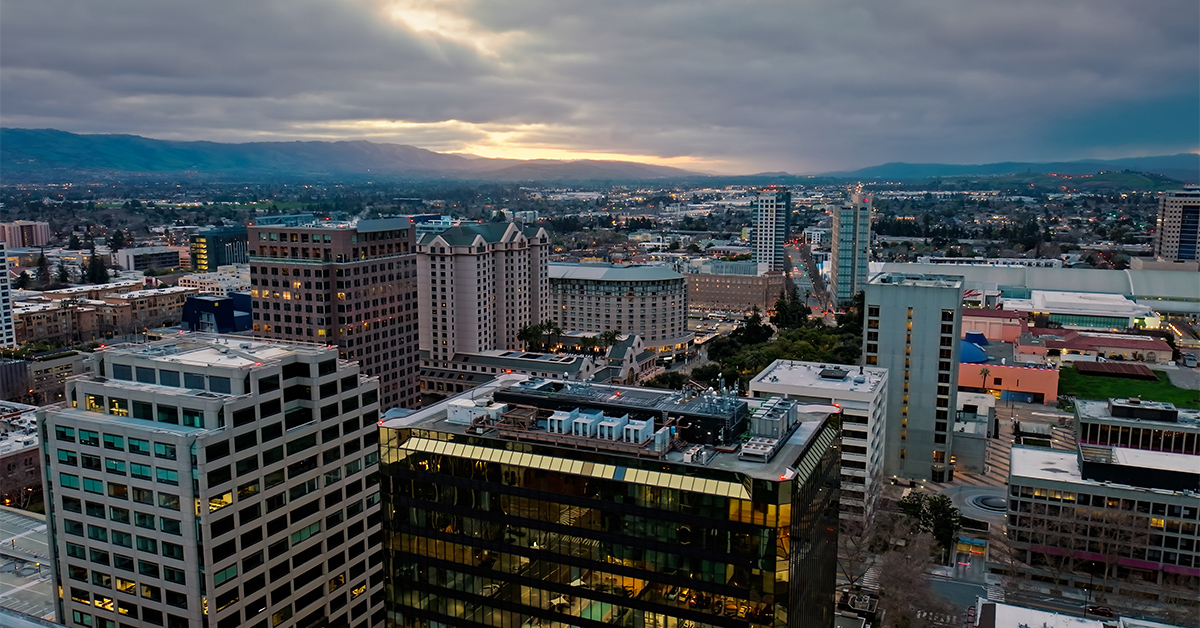 Aerial shot of San Jose, California at sunrise on a cloudy morning. Authorization was obtained from the FAA for this operation in restricted airspace.