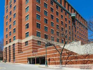Exterior shot featuring the office building at 10 Chestnut St. in Worcester, Mass., that Synergy Investments is converting into a multifamily property.