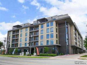 Exterior shot of The Saint George, a multifamily property in Austin owned by Stratus Properties