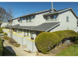 Exterior shot of Temescal Apartments, a 100-unit community in Davis, Calif.