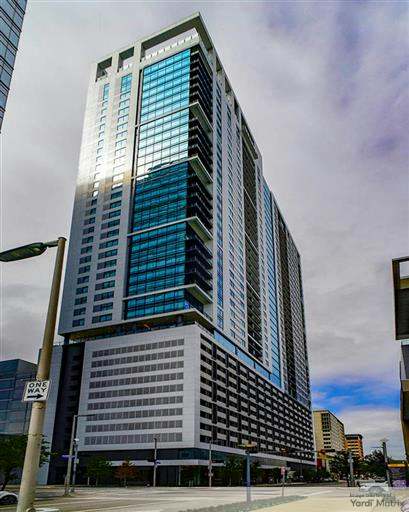 Exterior shot depicting Parkside Residences, a multifamily tower in downtown Houston.