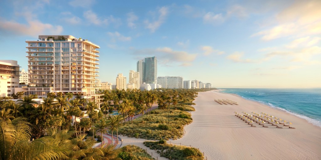 Beachfront luxury condo with glass balconies overlooks a sunlit beach. Palm trees, umbrellas, and turquoise ocean set a tranquil coastal scene.