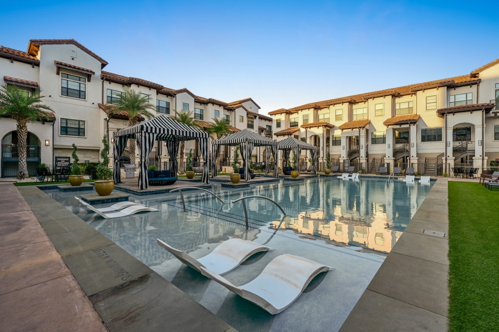 A photo of Domain Memorial, a 313-unit townhome rental community in Houston that was refinanced with an million loan by its owner Knightvest Capital